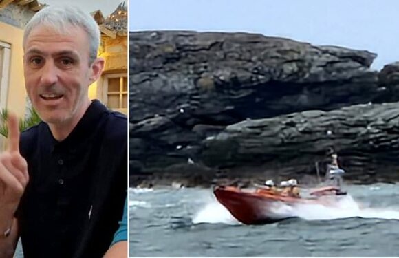 Pictured: Missing man, 46, swept into the sea from rocks in Anglesey