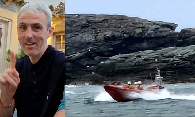 Pictured: Missing man, 46, swept into the sea from rocks in Anglesey