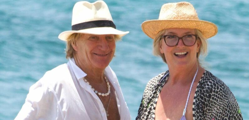 Rod Stewart looks besotted with bikini-clad wife Penny Lancaster on beach
