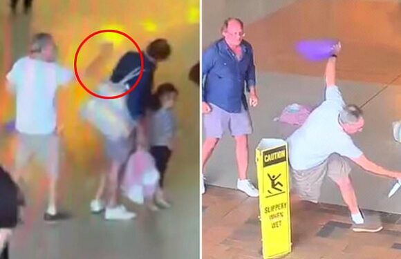 Shocking moment man stabs son-in-law at a busy train station