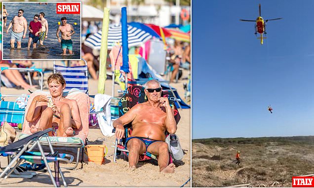 Sweltering tourists brave extreme heat to pack Benidorm beaches