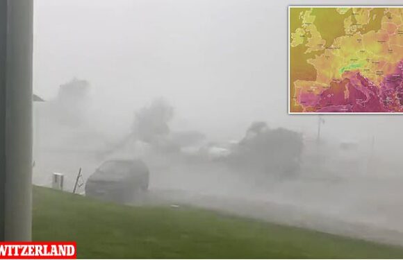 Terrifying moment daylight disappears as tornado hits Swiss town