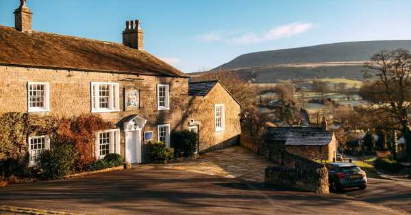 UK’s picturesque fairytale village where road markings and TV aerials are banned