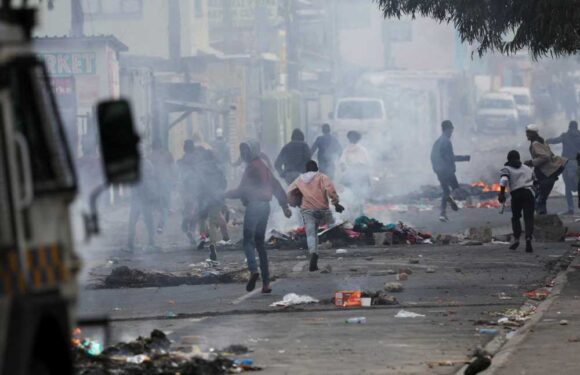 Brit shot dead after taking wrong turn from airport with family & driving straight into riot in Cape Town | The Sun