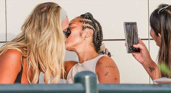 Christine McGuinness kisses Chelcee Grimes in Ibiza as ex Paddy celebrates 50th at home