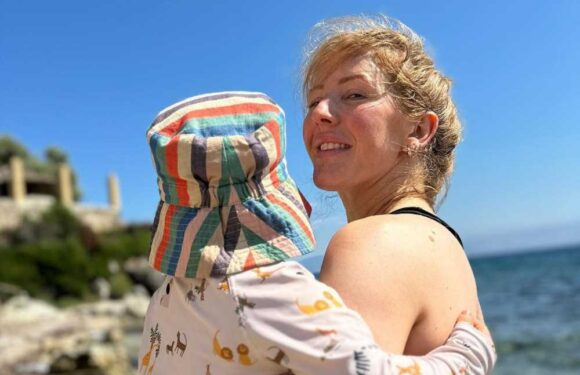 Ellie Goulding makes cryptic post following shock marriage split as she strips off to bikini on sun-soaked holiday | The Sun