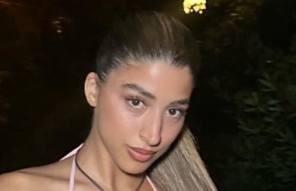 Forgotten Love Island star goes topless in a thong bikini as she goes for a dip on holiday | The Sun