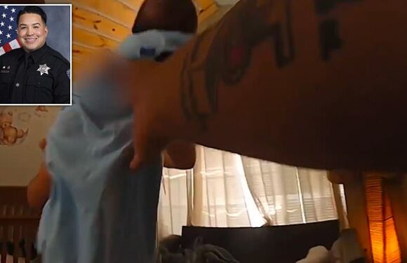 Heart-stopping moment hero cop saves one-month-old baby boy