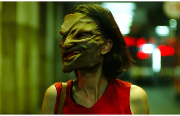 How My Mother, the Monster Was Inspired by a Photo of a Woman Walking in a Forest Wearing a Scary Mask