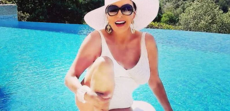 Joan Collins, 90, stuns in white swimsuit as she poses in her pool in France | The Sun