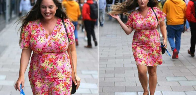 Kelly Brook stuns in pink floral mini-dress as she returns to work after incredible Italy holiday | The Sun