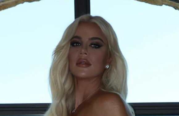 Khloe Kardashian flashes her bare butt in completely sheer white D&G dress in new photos that have left fans speechless | The Sun