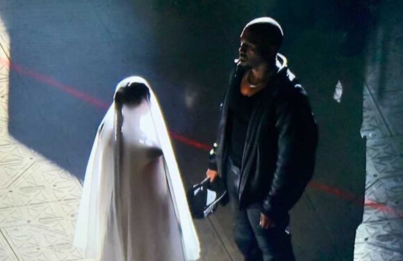 Kim Kardashian Wears Wedding Dress, Joins Kanye at 'Donda' Event