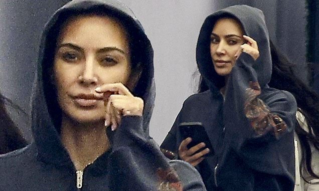 Kim Kardashian hides under hoodie on way to plastic surgeon's office