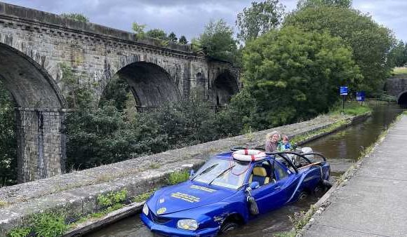 Man draws attention of Welsh locals by driving his floating car