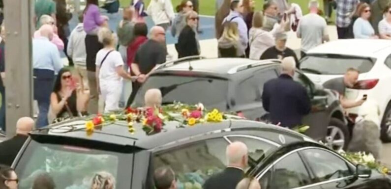 Moment Sinead O’Connor fan appears to take dog selfie next to her coffin