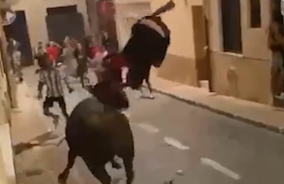Moment raging bull tramples and gores teenager around Spanish street