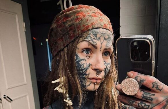 Mum with £17k worth of ink flaunts tattoos in sexy leather dress for hot date