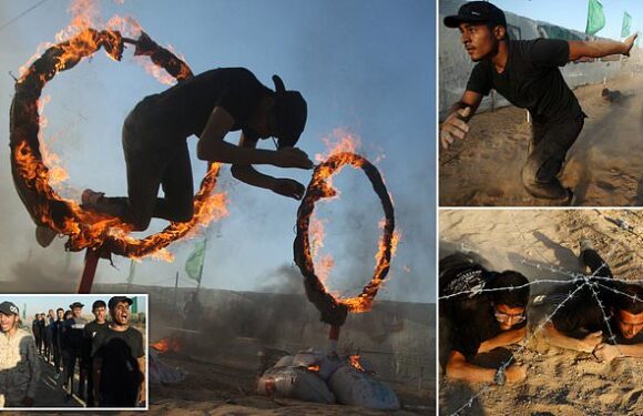 Palestinians jump through flaming hoops at Gaza military summer camp