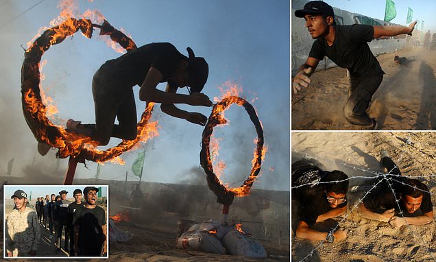 Palestinians jump through flaming hoops at Gaza military summer camp