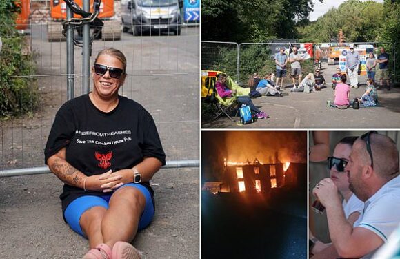 Protesters block removal of rubble from site of demolished pub