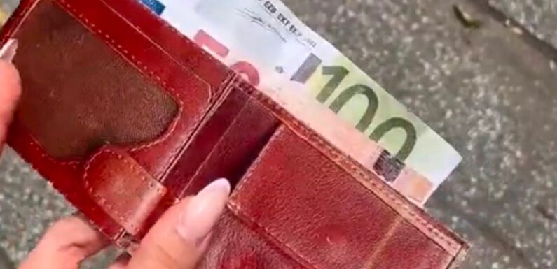 Woman picks up ‘wallet’ left on street – only to realise it’s ‘cruel’ trick
