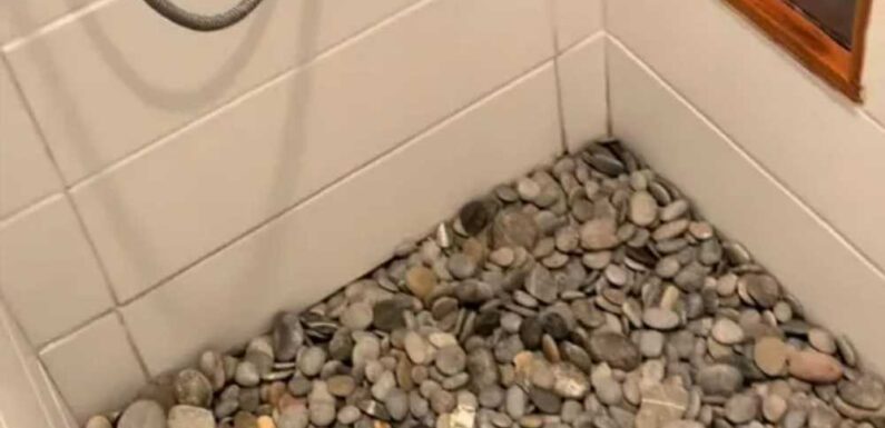 Couple share their unique shower flooring that's covered in river stones – and people are all saying the same thing | The Sun