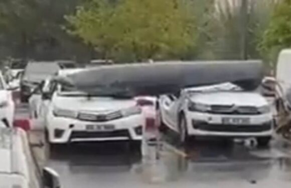 Fighter jet fuel tank drops and smashes cars in Turkish parking lot
