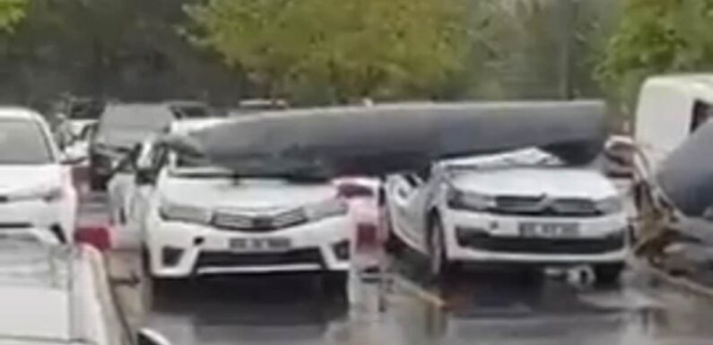 Fighter jet fuel tank drops and smashes cars in Turkish parking lot