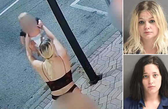 Horrifying moment two drunk women toss baby 'like a toy'