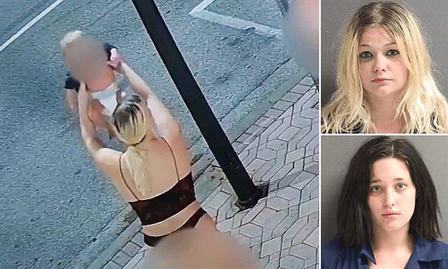 Horrifying moment two drunk women toss baby 'like a toy'