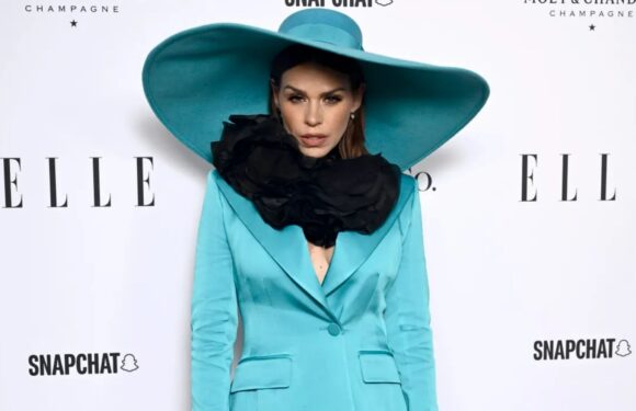 Huge 90s pop star is unrecognisable on the red carpet in floppy blue hat and matching suit – can you guess who? | The Sun