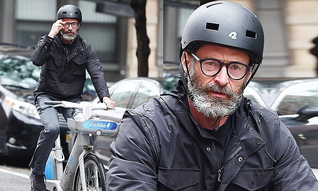Hugh Jackman enjoys solo bike ride in New York City
