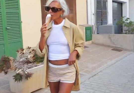 I'm grey and almost 60 but wear bikinis and crop tops all the time – I don’t care if people judge me, I know I look good | The Sun