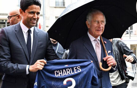 King Charles presented with PSG shirt by the club's Qatari owner