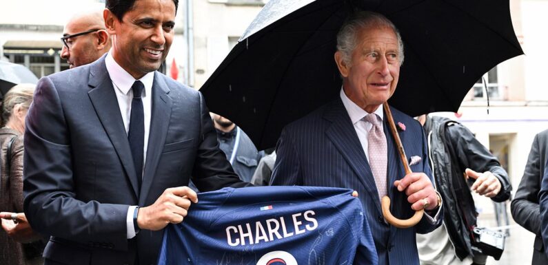 King Charles presented with PSG shirt by the club's Qatari owner