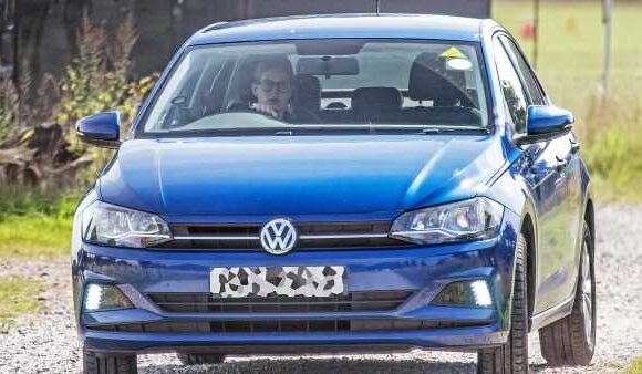 Lady Louise takes her blue VW for a spin around Windsor
