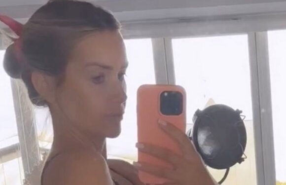 Laura Anderson shows off postpartum body in bra and shorts 12 days after giving birth