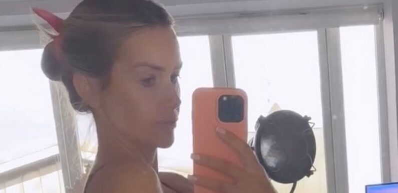 Laura Anderson shows off postpartum body in bra and shorts 12 days after giving birth