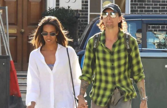 Noughties rock star splits from wife as he's spotted holding hands with new girlfriend | The Sun