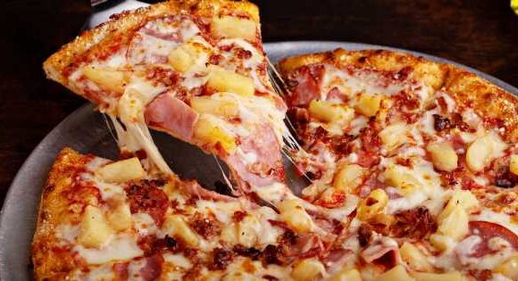 Pineapple on pizza ‘splitting nation apart’ as nearly 50% of Brits like topping