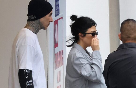 Pregnant Kourtney spotted leaving hospital with Travis