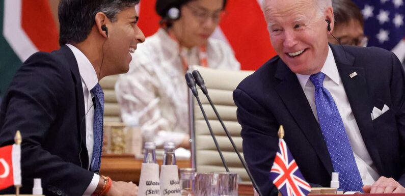 Rishi Sunak jokes with US president Biden as world leaders meet at G20