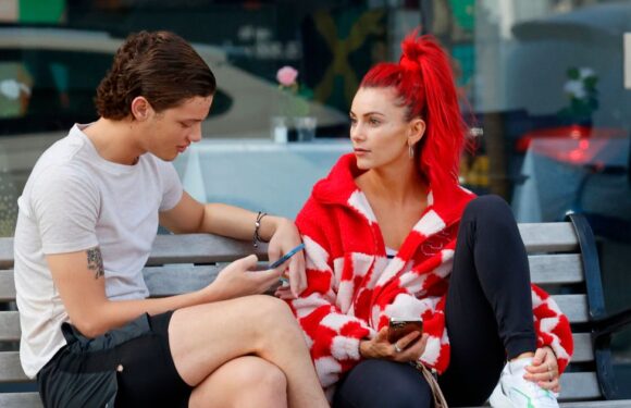 Strictly duo Bobby Brazier and Dianne Buswell look cosy as they walk arm in arm on playful day out