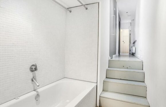 Tiny London flat with a bath in the hallway goes on sale for £475,000