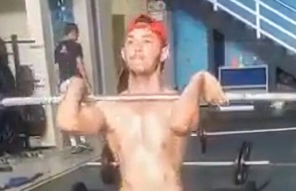 Weightlifter drops barbell on neck trying daring lift – then ‘violently shakes’