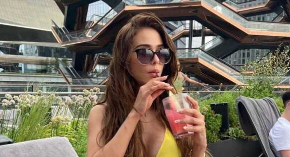 ‘World’s hottest weather girl’ turns up heat as she poses naked in fiery snaps