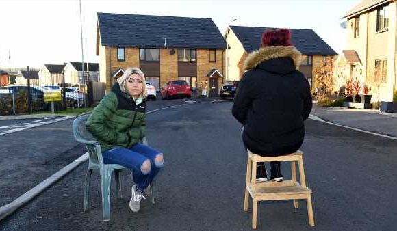 A school pick-up feud has been sparked on a quiet cul-de-sac