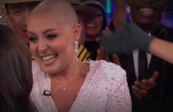 Amy Dowden gives health update as she returns to Strictly with shaved head after chemo for very special job | The Sun