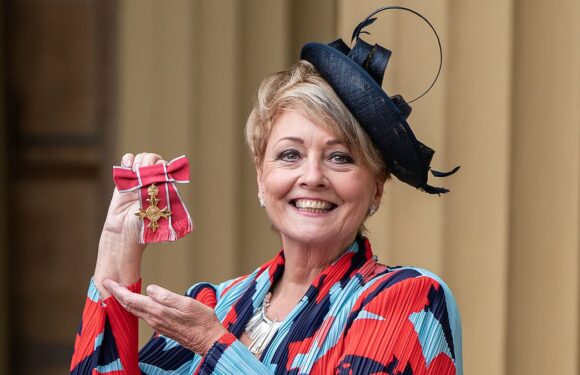 Anne Diamond looks delighted as she receives an OBE from King Charles